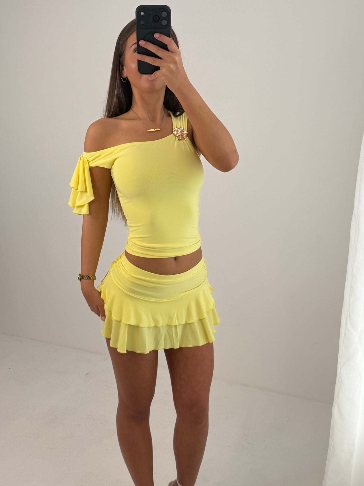 Summer outfit skort with layered detail and off the shoulder crop top