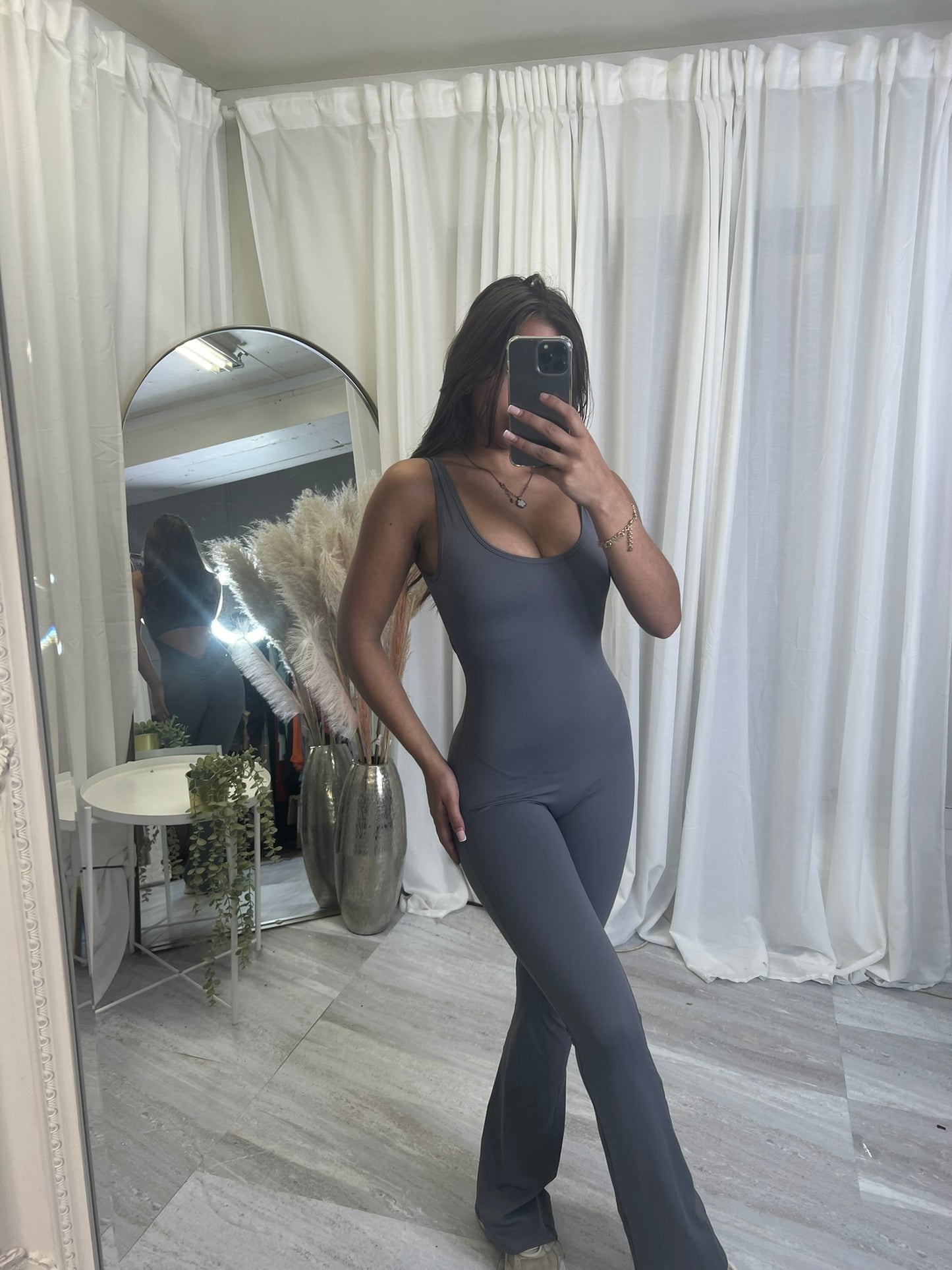 Flared bottoms sleeveless scrunch bum jumpsuit