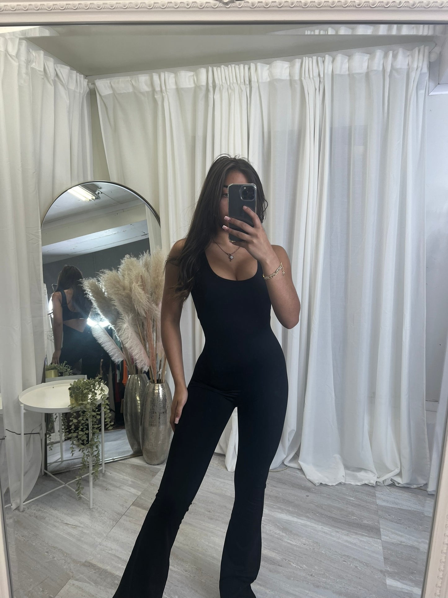 Flared bottoms sleeveless scrunch bum jumpsuit