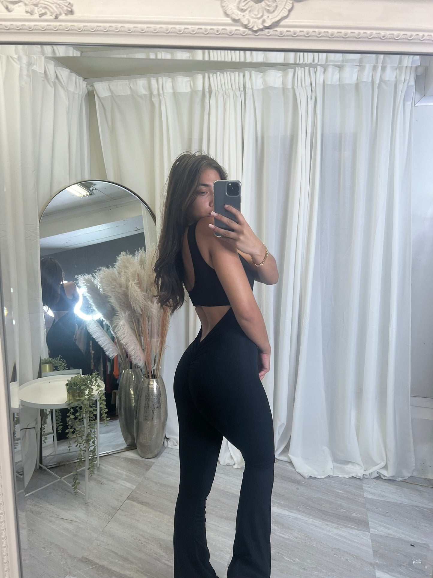Flared bottoms sleeveless scrunch bum jumpsuit