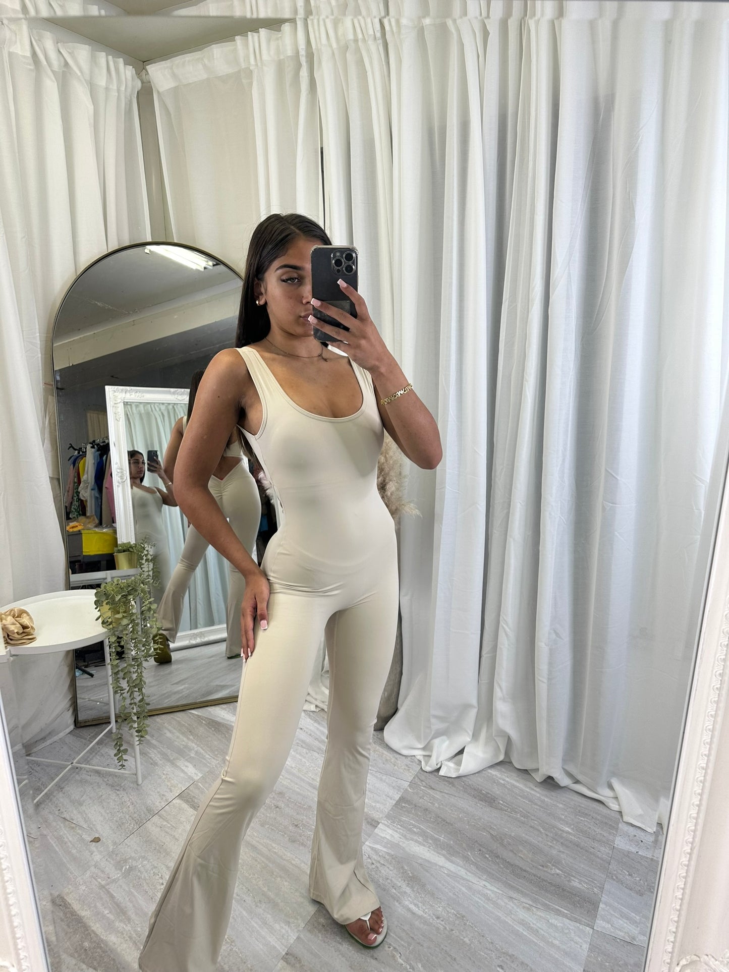 Flared bottoms sleeveless scrunch bum jumpsuit