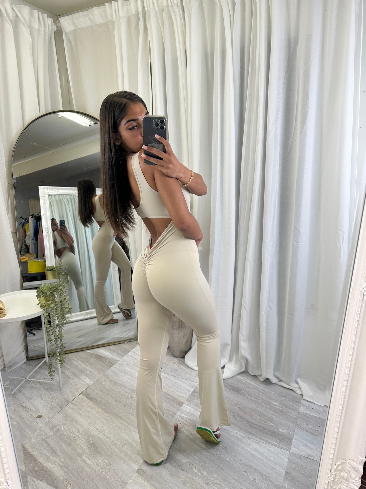 Flared bottoms sleeveless scrunch bum jumpsuit