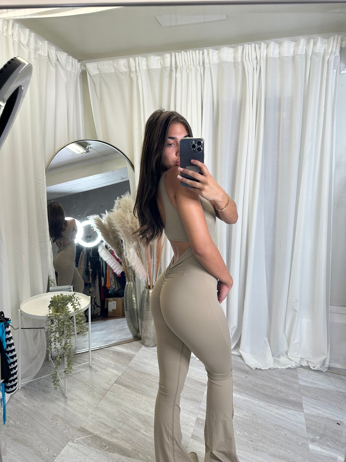 Flared bottoms sleeveless scrunch bum jumpsuit