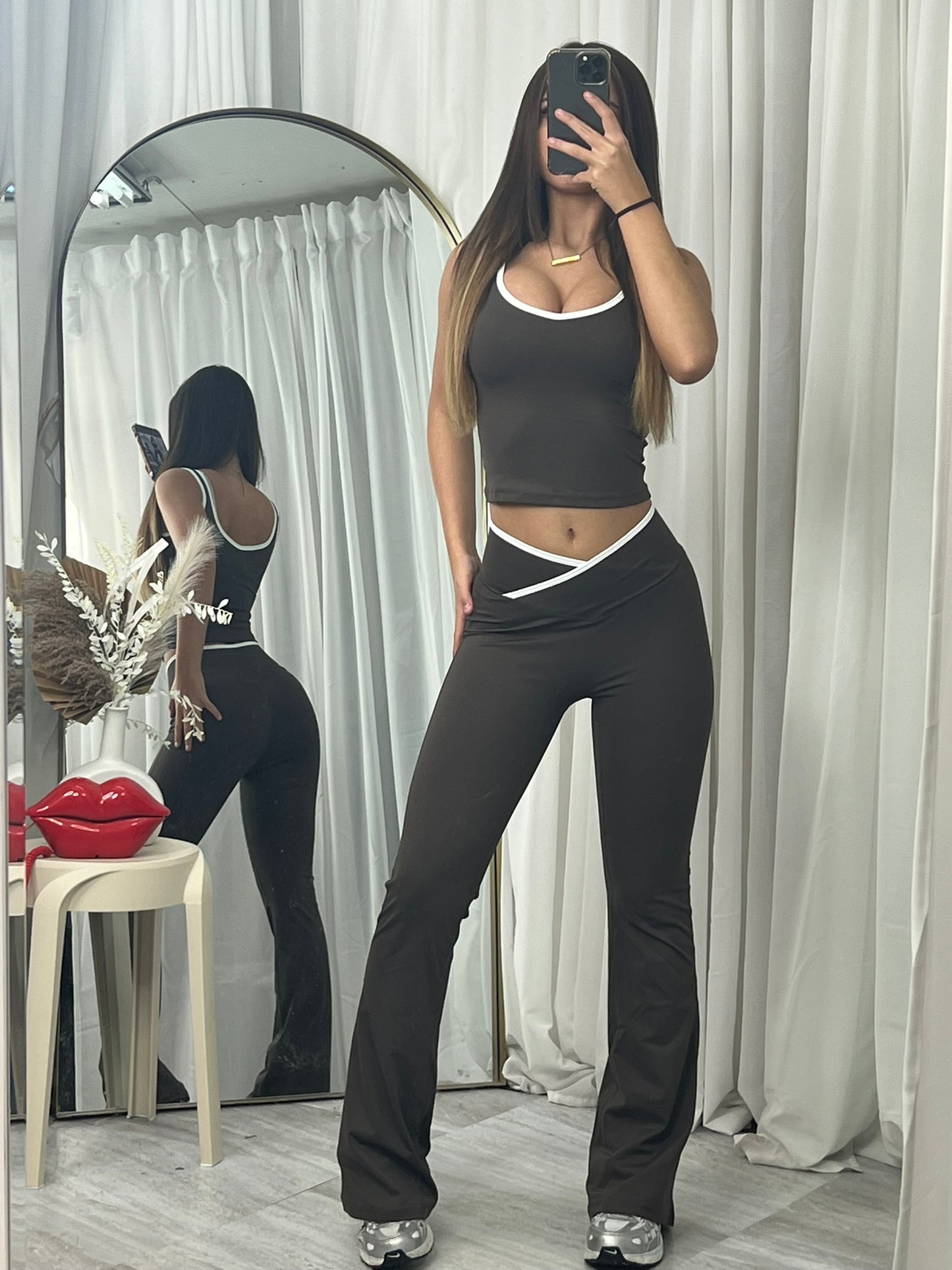 Sleeveless active lounge wear top and flared bottoms