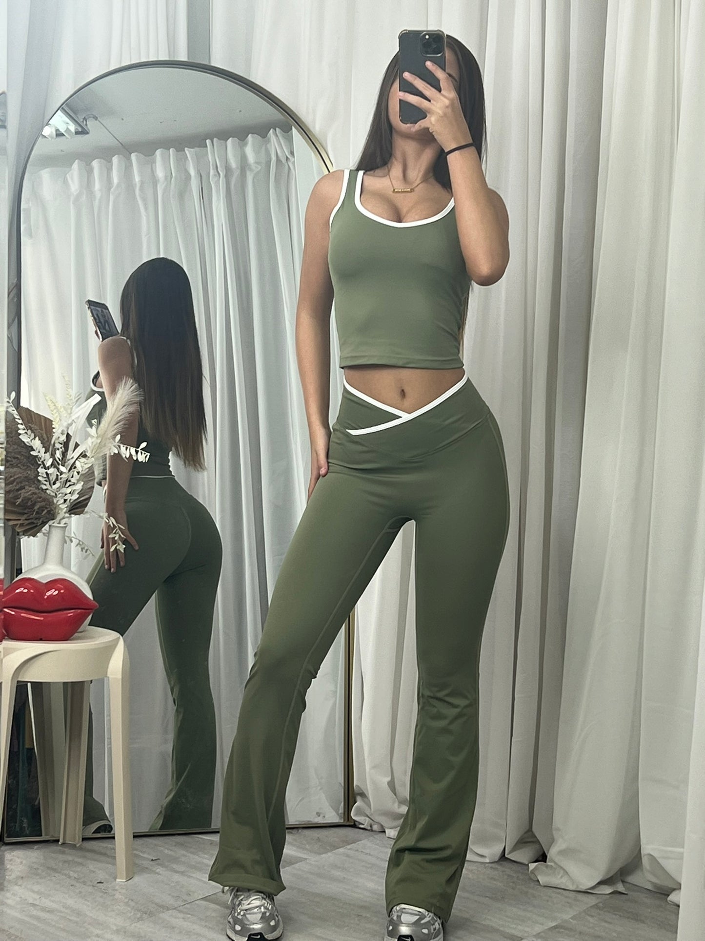 Sleeveless lounge wear top and flared bottoms