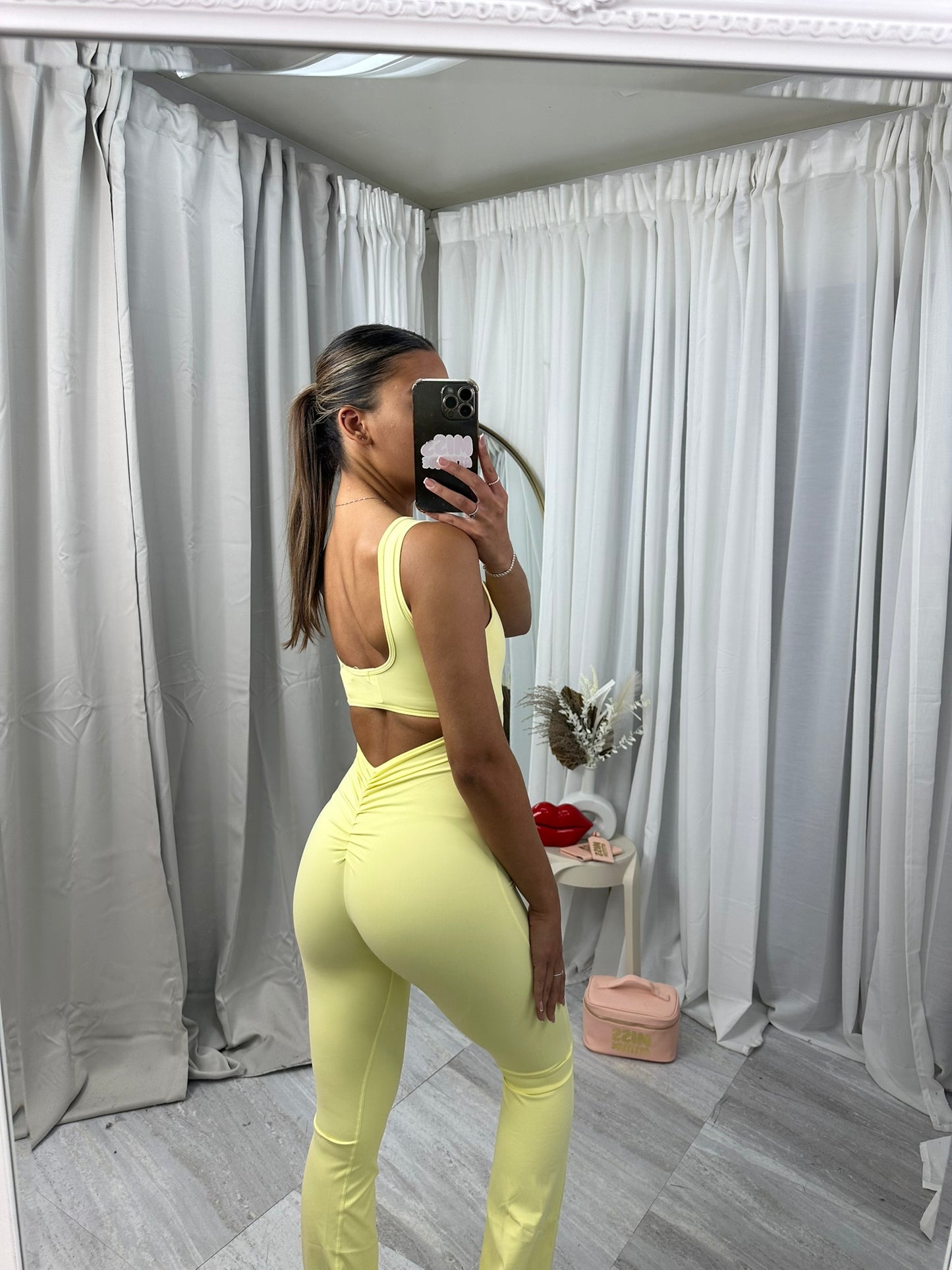 Flared bottoms sleeveless scrunch bum jumpsuit