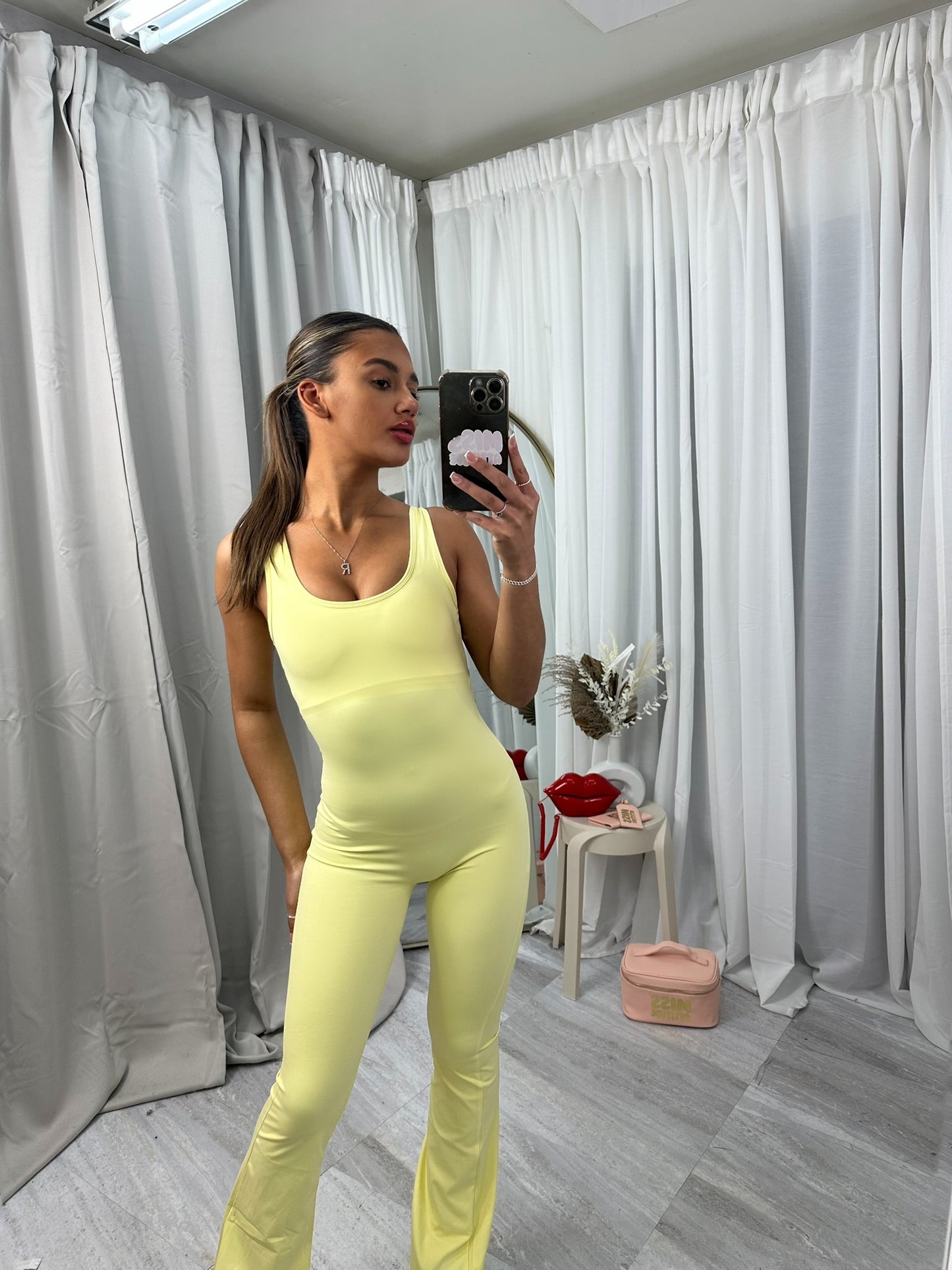 Flared bottoms sleeveless scrunch bum jumpsuit
