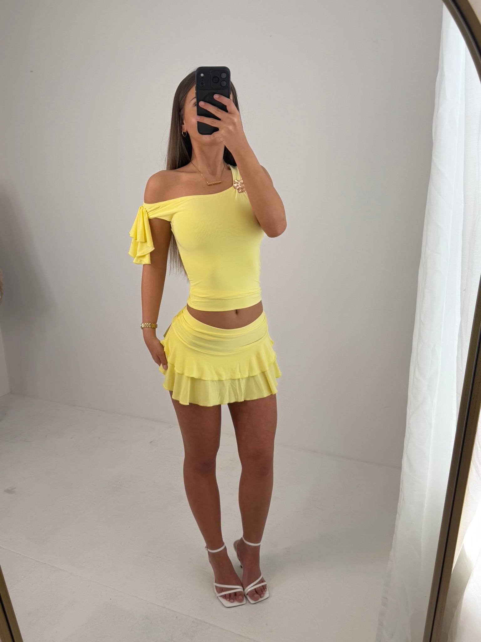 Summer outfit skort with layered detail and off the shoulder crop top