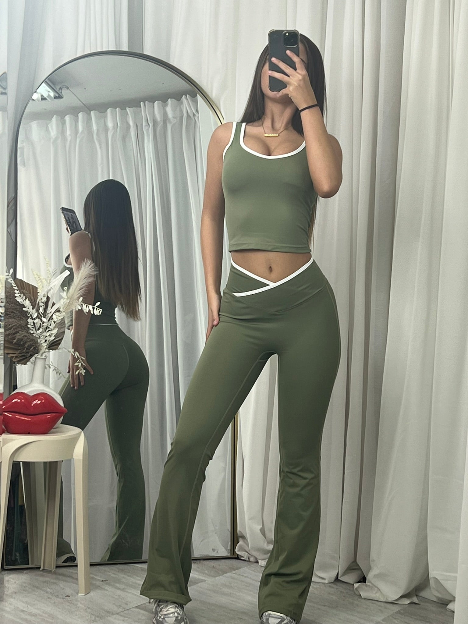 Sleeveless active lounge wear top and flared bottoms