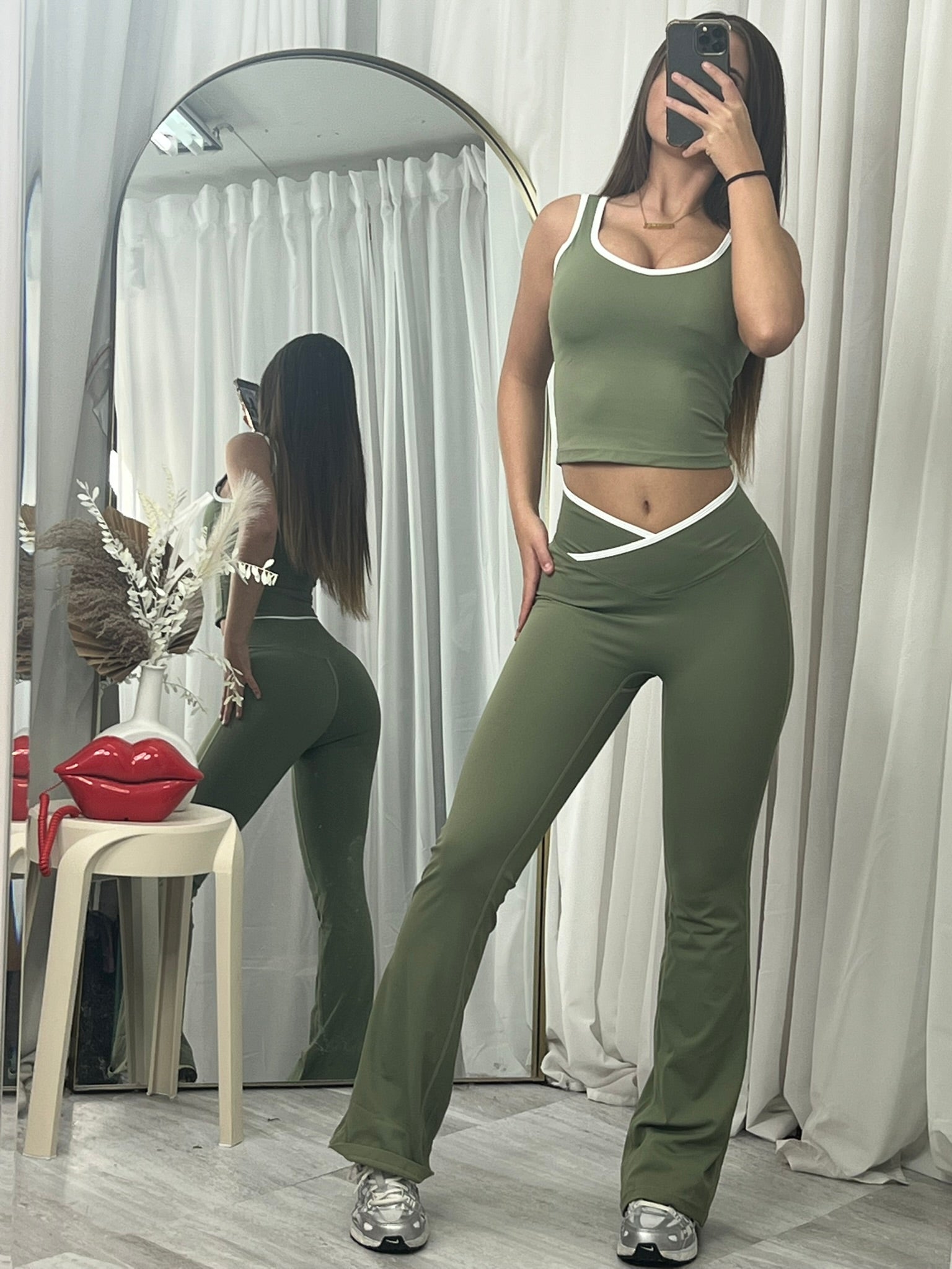 Sleeveless active lounge wear top and flared bottoms
