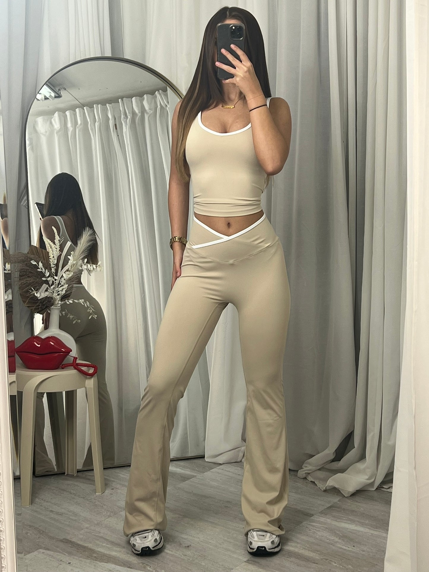 Sleeveless active lounge wear top and flared bottoms