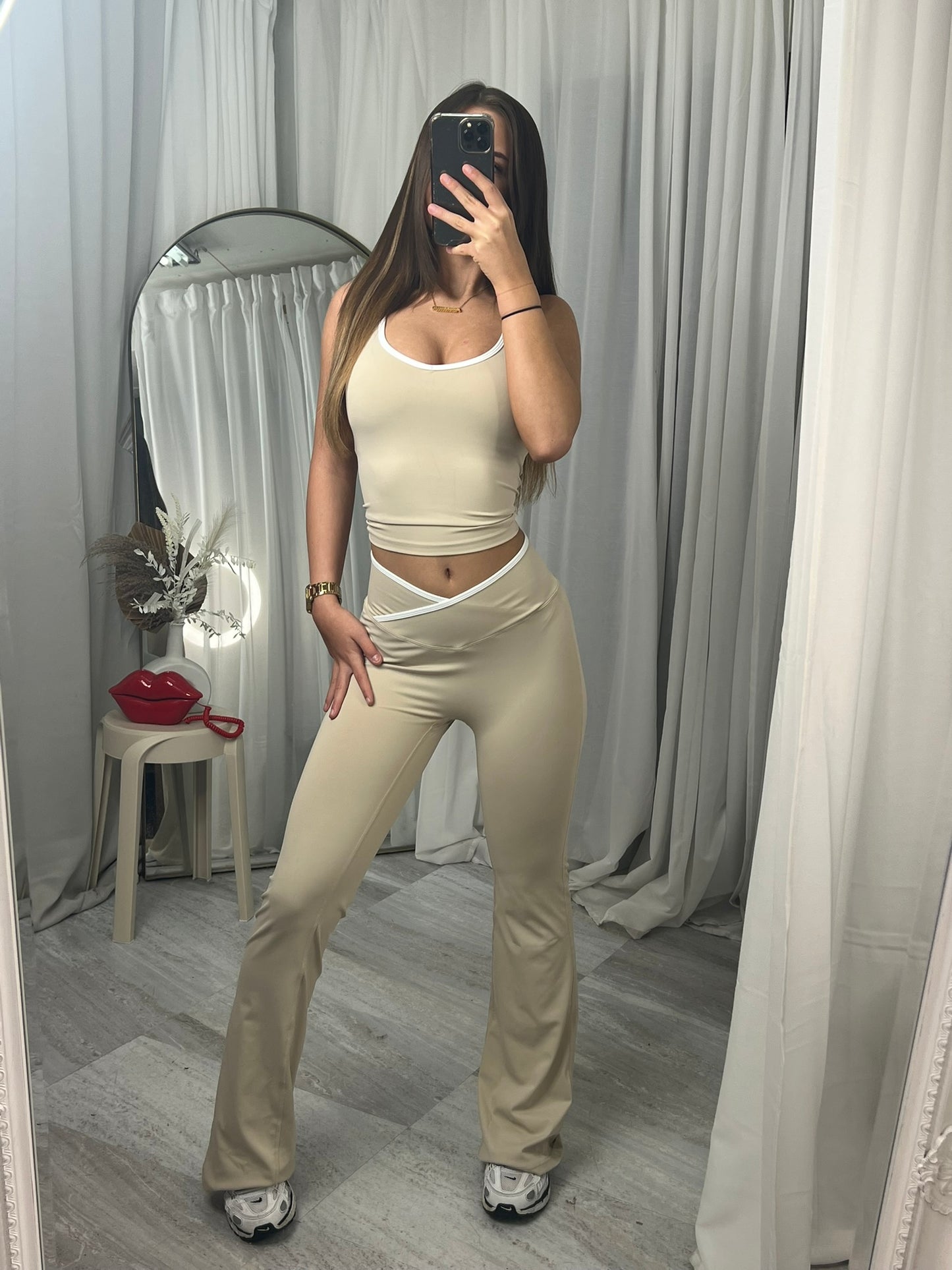 Sleeveless active lounge wear top and flared bottoms